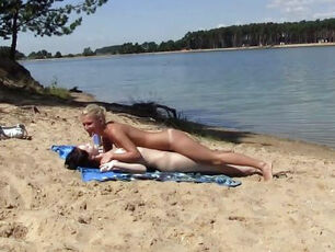 2 warm russian young woman getting a suntan on the free